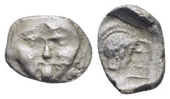 Pisidia. Selge circa 350-300 BC. Obol AR (0.99 Gr. 11mm.) 
Gorgoneion. 
Rev. Head of Athena to right, wearing crested Attic helmet; behind, astragalos...