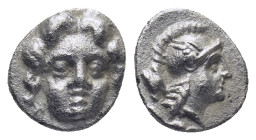 Pisidia. Selge circa 350-300 BC. Obol AR (1 Gr. 10mm.) 
Gorgoneion. 
Rev. Head of Athena to right, wearing crested Attic helmet; behind, astragalos.