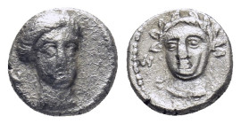 CILICIA, Nagidos. Circa 400-380 BC. AR Obol (0.77 Gr. 8mm.). 
Head of Aphrodite facing slightly right; N to left 
Rev. Wreathed head of young Dionysos...