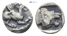 Troas, Assos. AR Obol. (0.53 g 9 mm). 5th century BC. Obv: Griffin seated right. Rev: Lion's head right within incuse square.