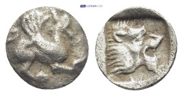 TROAS. Assos. (Circa 500-450 BC). AR Obol. (9mm, 0.52 g) Obv: Griffin seated to right, raising forepaw Rev: Head of roaring lion to right within shall...