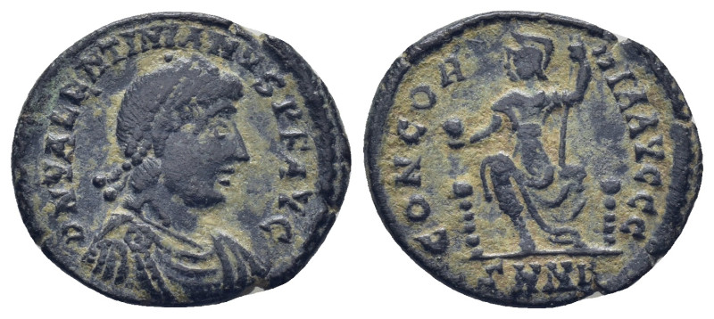 Valentinian II. (378-383 AD). AE Follis. Heraclea (2.4 Gr. 19mm.)
Pearl-diademed...