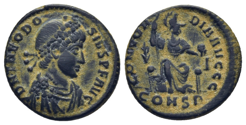 Theodosius I. (378-383 AD). AE. Follis. Constantinople. (2.8 Gr. 17mm.)
Pearl-di...