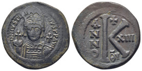 JUSTINIAN I. 527-565 AD. AE Half Follis. Antioch mint. Dated year 13 (539/540 AD). (11.1 Gr. 30mm.) Diademed, helmeted, and cuirassed facing bust, hol...