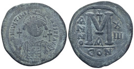 Justinian I Æ 40 Nummi. (39mm, 29 g) Constantinople, dated RY 13 = AD 539/40. D N IVSTINIANVS P P AVG, helmeted and cuirassed facing bust, holding glo...