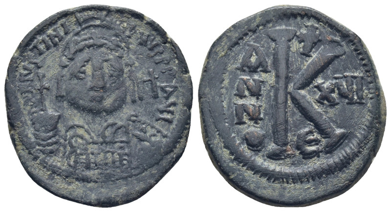 Justinian I, 527 - 565 AD AE Half Follis, Constantinople (10.7 Gr. 28mm.)
 Helme...