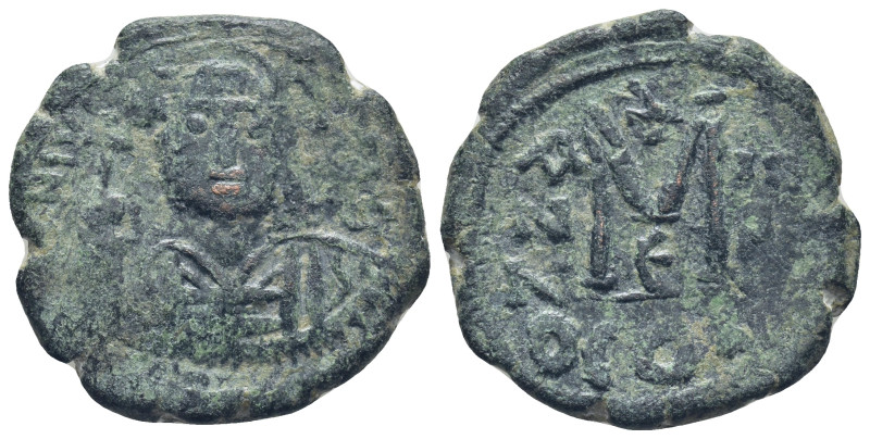 Justinian I. 527-565 AD. Æ Follis (30mm, 13,7 g). Constantinople mint. D N IVSTI...