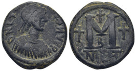 Justinian I. AD 527-565. Nikomedia Follis. AE (28mm, 17.4 g) Obv: D N IVSTINIANVS P..., pearl diademed, draped, cuirassed bust right. Rev: Large M, cr...