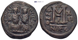 Justin II and Sophia (565-578) AE Follis (Bronze, 13.15 g, 28mm) Nikomedia Obv: D N IVSTI-NVS P P, Justin and Sophia, both nimbate, enthroned facing, ...