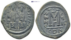 Justin II, with Sophia. 565-578. Æ Follis (29mm, 14.4 g). Constantinople mint, 1st officina. Dated RY 8 (572/3). D N IVSTI NVS P P AVI, nimbate figure...