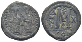 Justin II, with Sophia. 565-578. AE Follis. Constantinople, (13.3 Gr. 28mm.) 
Justin and Sophia, both nimbate, enthroned facing; Justin holding globus...