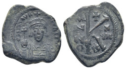 Maurice Tiberius. 582-602.AE Half Follis (3.9 Gr. 22mm.). 
Crowned and cuirassed bust facing, holding globus cruciger in right hand, shield over left ...