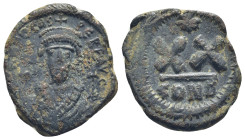 PHOCAS (602-610). Half Follis. Constantinople. (6 Gr. 24mm.)
 Crowned bust facing, wearing consular robes and holding mappa and cross. 
Rev. Large XX;...