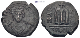 Phocas Æ 40 Nummi. (25mm, 10.13 g) Antioch, dated RY 8 = AD 609/10. D N FOCA NЄ PЄ AV, crowned bust facing , wearing consular robes, holding globus cr...