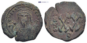 Phocas, 23 November 602 – 5 October 610. Half follis, Antiochia 608-609, Æ (20mm, 5.7 g). Crowned and mantled bust facing, holding mappa and eagle- ti...