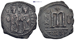 Phocas. 602-610. Æ Follis (27mm, 11.9 g). Theoupolis (Antioch) mint. Dated RY 5 (606/7). Phocas, holding globus cruciger, and Leontia, holding crucifo...