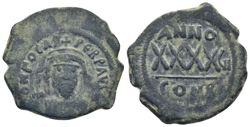 Phocas. AD 602-610. Constantinople Follis Æ (29mm., 11.5 g). Crowned bust facing...