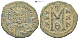 Theophilus Æ 40 Nummi. (27mm, 5.58 g)Constantinople, AD 829-831. ΘЄOFIL bASIL, bust facing with short beard, wearing crown and chlamys, and holding pa...