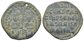 Basil I, the Macedonian. 867-886. Æ Follis (26mm, 6.48 g). Constantinople mint, 867-876. bASILIO S CONST BASILIS, Basil, crowned, bearded and wearing ...
