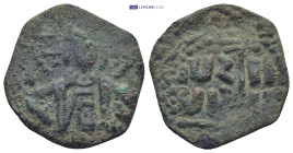 Crusader States, Edessa (County). Joscelin I or II Æ Follis. (23mm, 3.0 g) 1119-1150. Nimbate and crowned bust, holding book of Gospels and cross; unc...