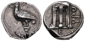 Bruttium, Crotone. AR, Nomos/Stater. 7.9 g. - 20 mm. Circa 425-350 BC.
Obv.: Ϙ[POT]. Eagle standing left with closed wings on Ionic capital, beak open...