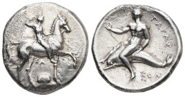 Calabria, Tarentum. AR, Didrachm or Nomos. 7.90 g. - 23.00 mm. Circa 332-302 BC.
Obv.: Youthful nude jockey riding horse walking to right, holding the...
