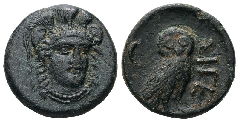 Troas, Sigeion. Ae, 5.93 g 18.66 mm. 355-334 BC.
Obv: Helmeted head of Athena fa...