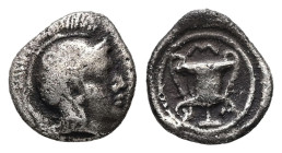 Lesbos, Methymna. AR Hemiobol. 0.44 g 8.19 mm. Circa 450-379 BC.
Obv: Helmeted head of Athena to right.
Rev: Kantharos; Μ-Α-Θ around.
Ref: SNG Copenha...