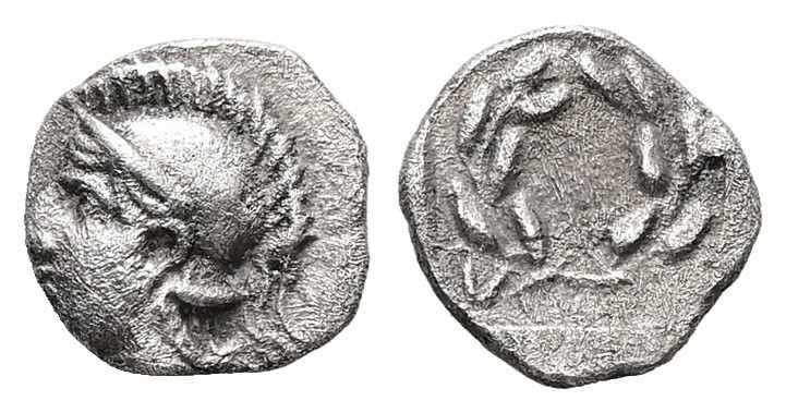 Aeolis, Elaia. AR Hemiobol, 0.40 g 8.04 mm. Circa 450-400 BC.
Obv: Helmeted head...