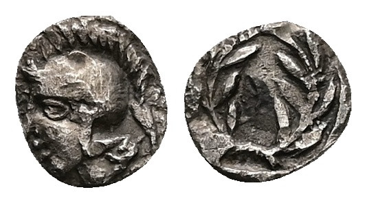 Aeolis, Elaia. AR Hemiobol, 0.36 g 7.89 mm. Circa 450-400 BC.
Obv: Helmeted head...