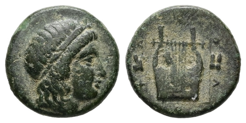 Ionia, Kolophon. Ae, 1.76 g 11.98 mm. Circa 389-350 BC.
Obv: Head of Apollo righ...
