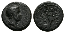 Ionia, Smyrna. Britannicus (?), AD 41-55. AE. 3.64 g. 15.45 mm. Philistos and Eikadios, magistrates.
Obv: ΖΜΥ. Draped head of Britannicus (?), right.
...