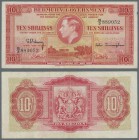 Bermuda: 10 Shillings 1937, series ”S/3”, P.10b, very nice note with lightly toned paper, tiny spot at upper right border and a few folds. Condition: ...