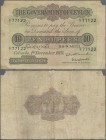 Ceylon: 10 Rupees 1925 P. 12c, used with folds and creases, light stain in paper, upper left and right corners missing, small hole at upper center, lo...