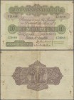 Ceylon: 10 Rupees 1936 P. 25, used with folds and creases, stain dots in paper, several pinholes, no repairs, not pressed, condition: F to F+.