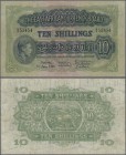 East Africa: 10 Shillings 1939, P.29, nice note with bright colors, small taped tear at lower margin and pressed. Condition: F