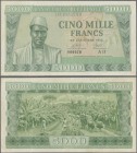 Guinea: 5000 Frans 1958 P. 10, used with light folds, pressed, still strongness in paper and nice colors, no holes or tears, condition: F to F+.