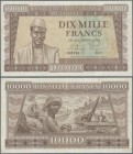 Guinea: 10.000 Francs 1958 P. 11, used with folds, probably pressed but still strong paper and nice colors, minor tear at upper border, condition: F.
