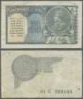 India: 1 Rupee 1935 with watermark Portrai King George V, P.14a, still nice condition with several folds, some brownish spots and a few stains along t...
