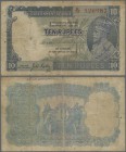 India: 10 Rupees ND(1928-32) P. 16b, stronger used with strong folds, writings and stain in paper, pinholes, but no repairs, condition: F-.