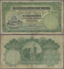 Palestine: 1 Pound 1929 P. 7b, a bit stronger used with folds and stain in paper, borders a bit worn but no repairs, condition: F-.