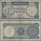 Qatar & Dubai: 10 Riyals 1960 P. 3 in used condition with several folds and creases, no holes or tears, writing in watermark area, not washed or press...