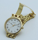 TISSOT -Lady- Movimento al quarzo. Cassa in acciaio placcato oro con diametro da 25mm. Dial bianco a numeri romani neri. Finestra per la data al 3. Or...