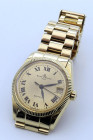 BAUME & MERCIER Baumatic. -Lady- Referenza 3194. Cal. 860 a carica automatica. Cassa in oro giallo 18kt con diametro da 28mm. Dial champagne a numeri ...