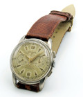 LEMANIA -Cronografo vintage- Movimento a carica manuale. Cassa in acciaio con diametro da 37mm. Dial panna con numeri arabi ed indici applicati. Funzi...