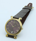 RAYMOND WEIL Referenza 9136-2. Movimento al quarzo. Cassa placcata in oro giallo 18kt con diametro da 33mm. Dial “purple” con numeri romani dorati. Or...