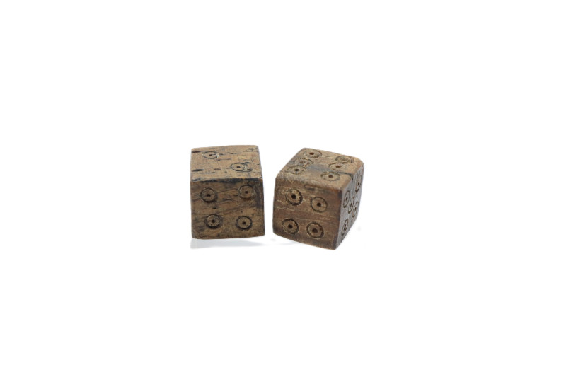 Pair of Roman Bone Dice 1st -3rd C. AD.

Bone cubes with incised dotted rings ...