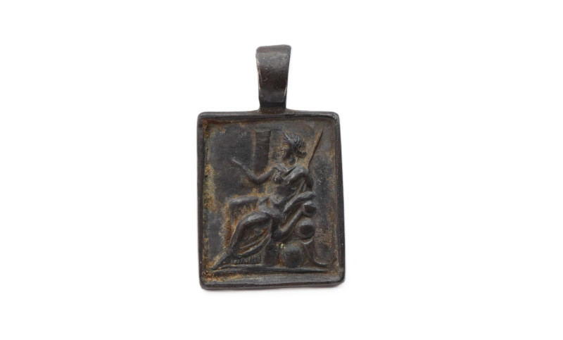 Roman Silver Pendant with Seated Roma 1st, 3rd Century AD

A solid silver - re...