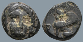CARIA. Kaunos. (Circa 390-370 BC)
AE Chalkous (9.9mm 0.92g)
Obv: Laureate head of Apollo facing slightly to right.
Rev: &#66236; - Γ Sphinx seated ...