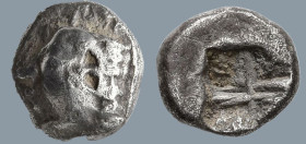 IONIA. Kolophon (?). (Late 6th century BC).
1/24 Stater or Hemiobol (6.3mm 0.46g)
Obv: Archaic head of Apollo left.
Rev: Incuse square punch.
SNG ...